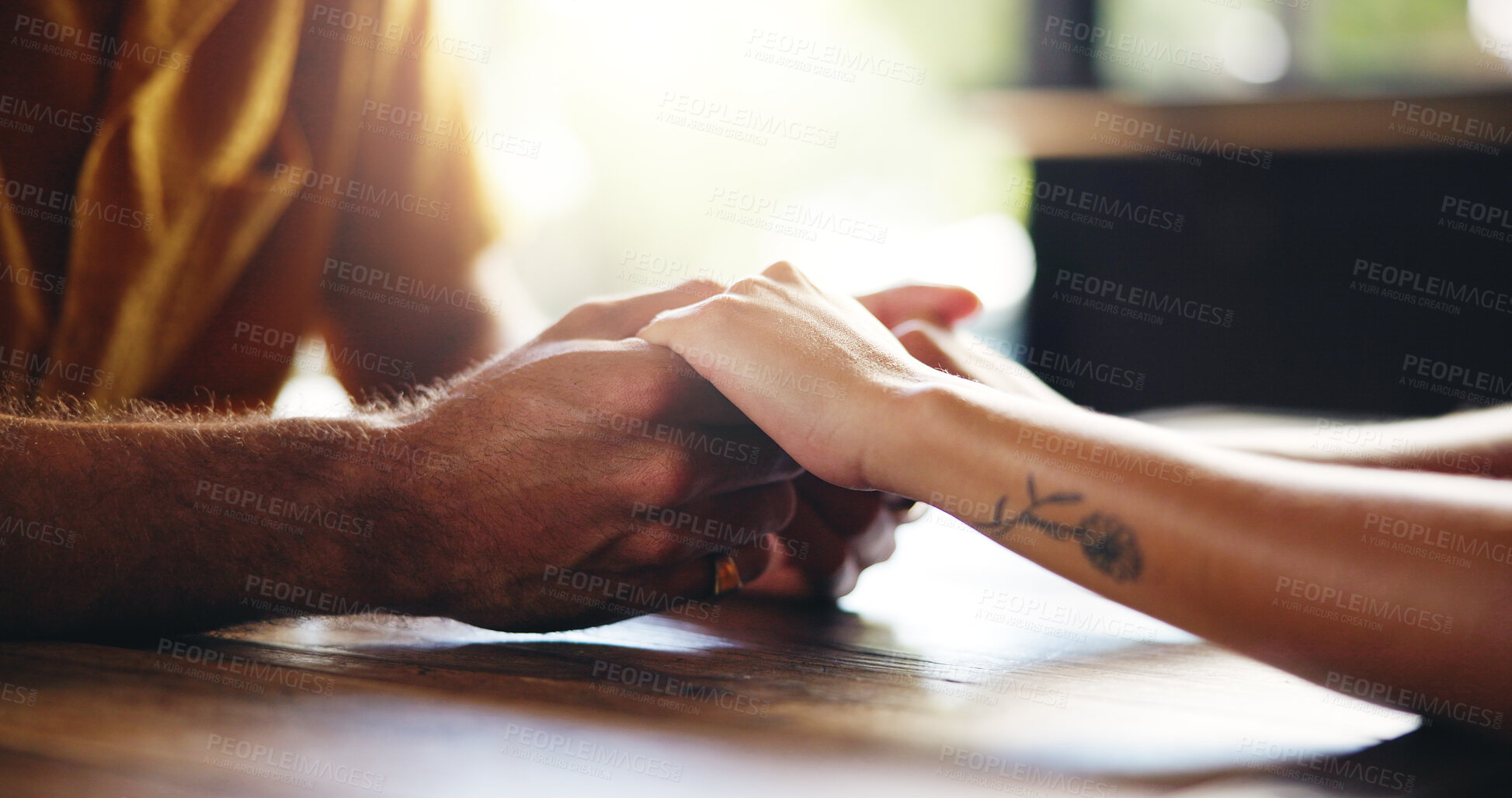 Buy stock photo Closeup, couple and holding hands with love for support, respect and bonding together with trust in marriage. Restaurant, man and woman with compassion for hope, connection or commitment with care
