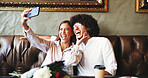 Date, laughing and selfie with couple in coffee shop together for bonding, memories or romance. App, profile picture or social media with funny man and woman in booth of cafe for valentines day