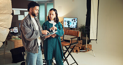Buy stock photo Photography, planning and tablet with people in studio for behind the scenes, team and production. Discussion, project and creative director with man and woman on set for photoshoot and magazine