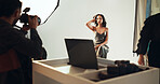Production, photographer and woman in studio, creative and pictures for fashion magazine and photoshoot. Backstage, artist and group with project for media agency, camera or equipment for photography