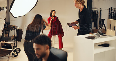 Buy stock photo Photoshoot, photographer and model in studio, creative and pictures for fashion magazine or production. Backstage, people and group with project for media agency, camera and equipment for photography