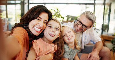 Buy stock photo Selfie, happy and family on sofa in home for memory, bonding or social media post together. Goofy, photography and parents with girl children for silly profile picture in living room at house.