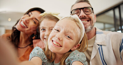 Buy stock photo Selfie, smile and family on sofa in home for memory, bonding or social media post together. Goofy, photography and parents with girl children for silly profile picture in living room at house.