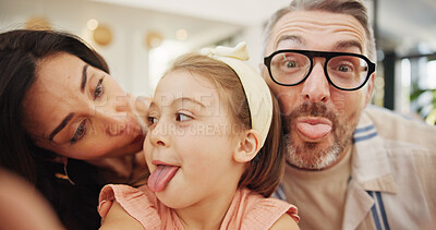 Buy stock photo Selfie, goofy and family in home with happy for memory, bonding or social media post together. Portrait, photography POV and parents with girl child for silly profile picture in living room at house.
