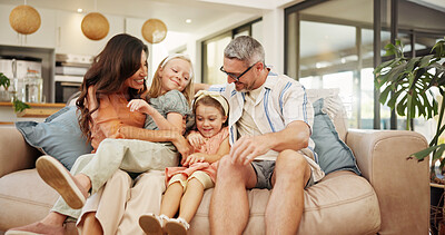 Buy stock photo Happy, parents and children relax at house with love, communication and bonding together. Smile, family and kids resting with hug for playful games, security and weekend break for comfort in lounge