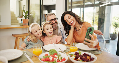 Buy stock photo Selfie, smile and family at dining table for lunch in home together with memory, bonding or connection. Photography, food and parents with girl children for profile picture with healthy meal in house