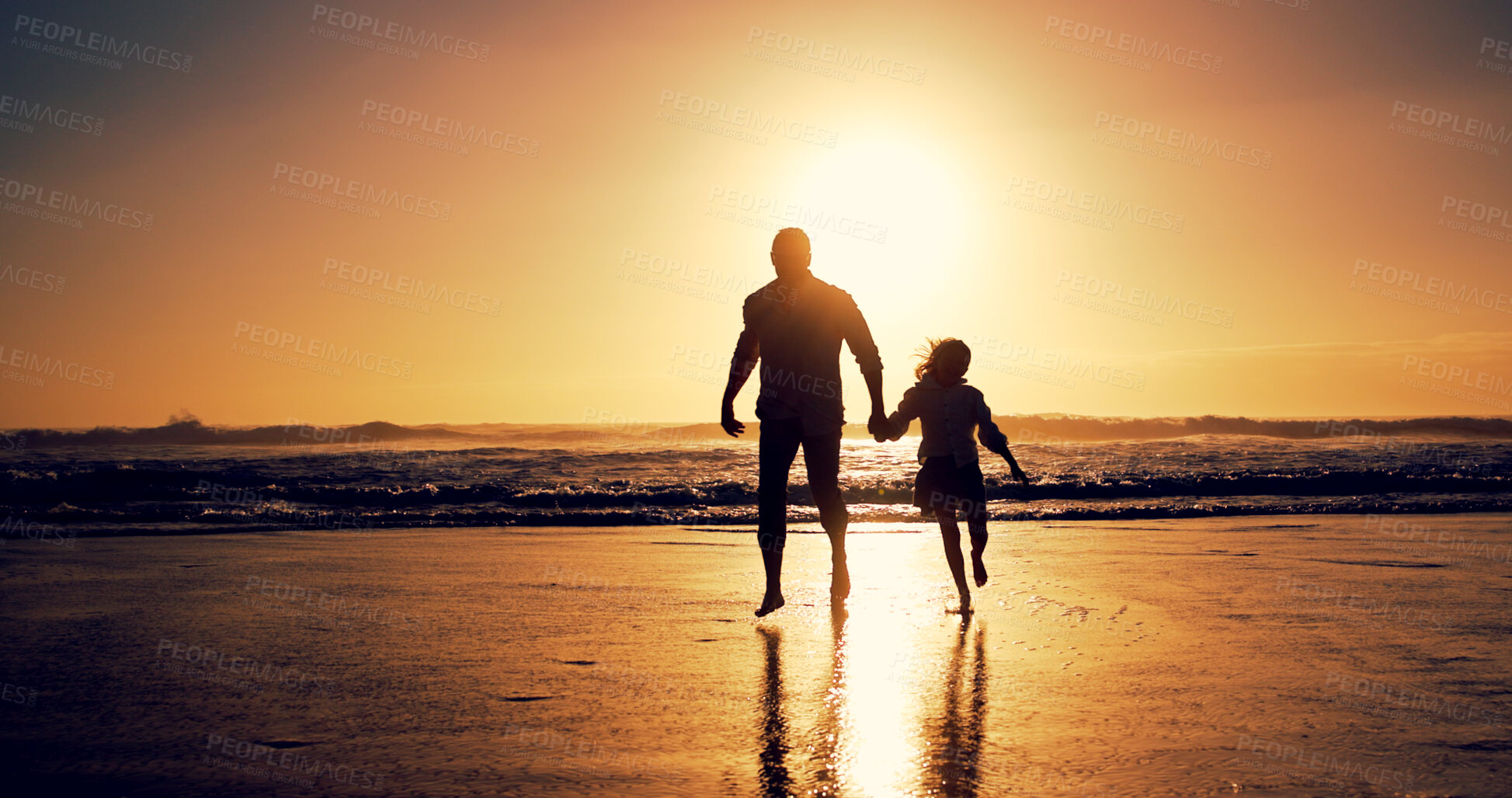 Buy stock photo Ocean, sunset and father with girl, holding hands and travel with happiness, bonding together and wellness. Nature, beach and family with parent, daughter and dad with summer holiday and silhouette