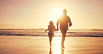Holding hands, sunset and dad with girl, beach and travel with happiness, bonding together and fun. Nature, seaside and family with parent, daughter and father with summer holiday, journey or running