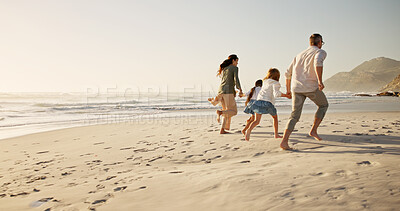Buy stock photo Running, family and holding hands at beach for vacation, mockup space or back outdoor with energy. Race, mother and father with children at ocean for travel, summer adventure or playing with parents