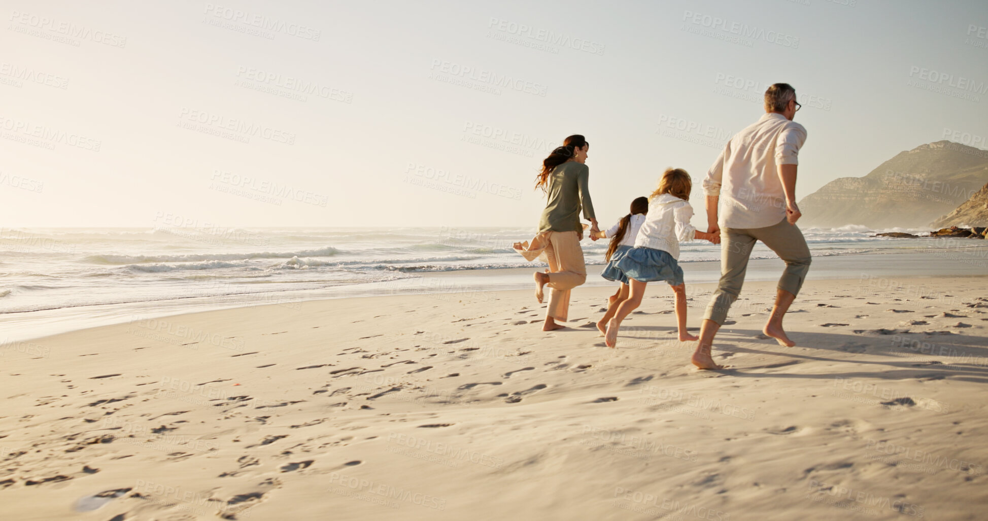 Buy stock photo Running, family and holding hands at beach for vacation, mockup space or back outdoor with energy. Race, mother and father with children at ocean for travel, summer adventure or playing with parents