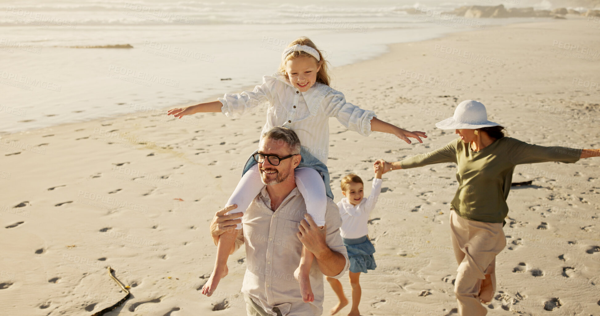Buy stock photo Family, holiday or walking at beach for balance, piggyback or travel in Australia with siblings, girls or love. Above, mom or dad with children at sea on fun vacation for playing, bonding or games