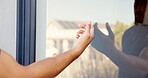Hand, person and knocking on door of house for entrance, arrival alert and respect of visit homeowner. Guest, glass and reflection with announcement, show manners and attention for welcome permission