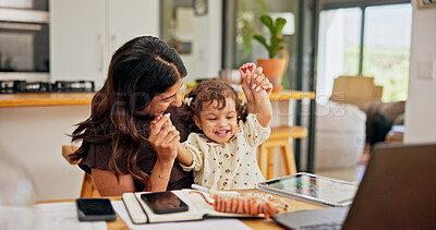 Buy stock photo Play, multitask or remote work with mother and baby in home for development of small business. Cheering, hands raised or success with single parent and child in apartment for freelance startup
