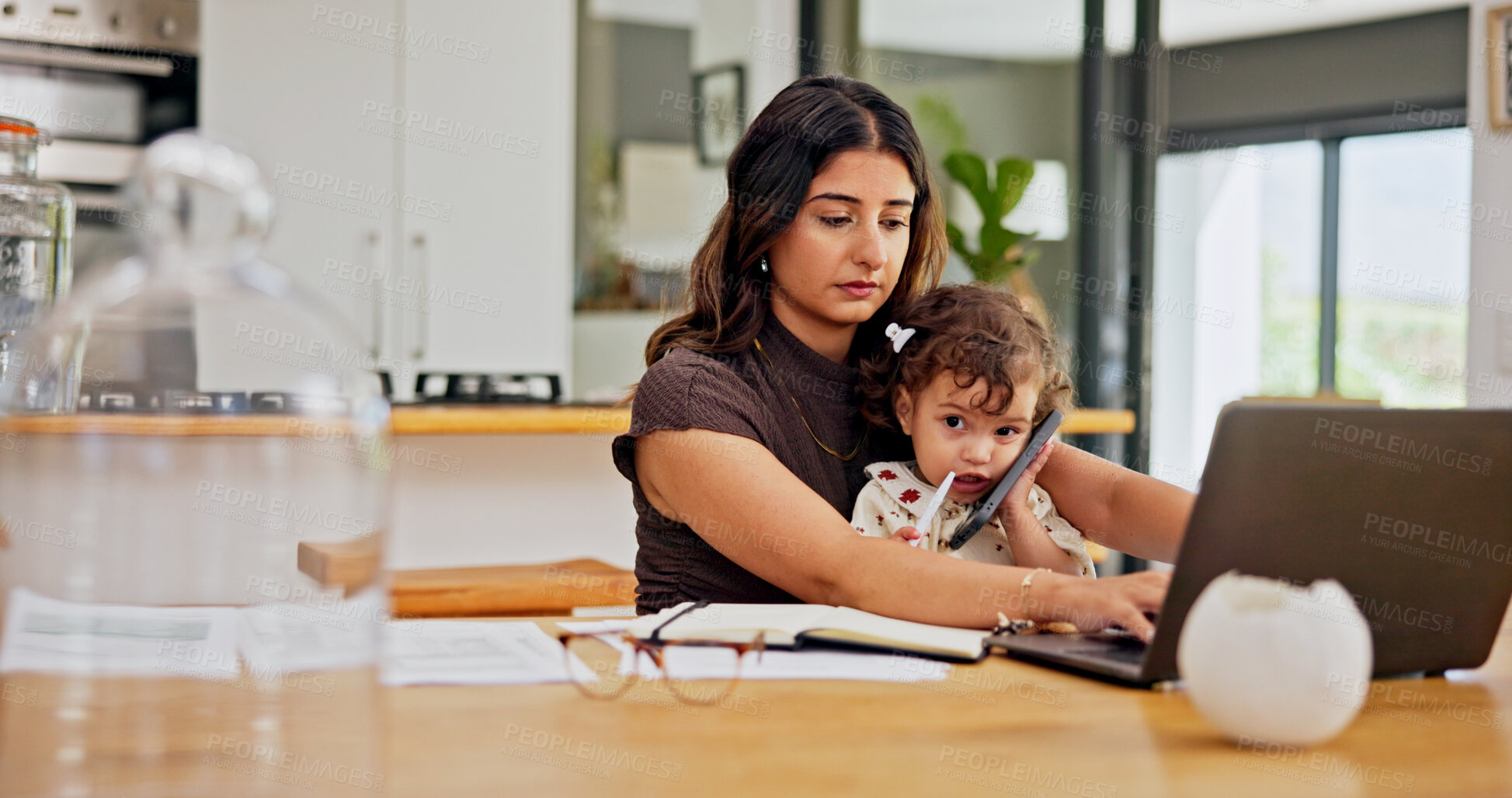 Buy stock photo Laptop, phone or remote work with woman and baby in home for small business multitasking. Busy, report or typing with single mother and child in apartment for freelance career or startup job