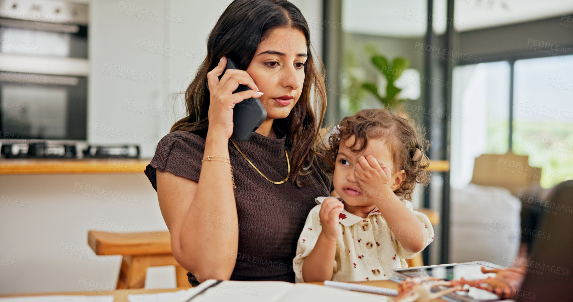 Buy stock photo Home, baby and mother with phone call for communication, networking and freelancer with technology. Kitchen, kid and woman with multitasking for remote work, conversation and child care in apartment