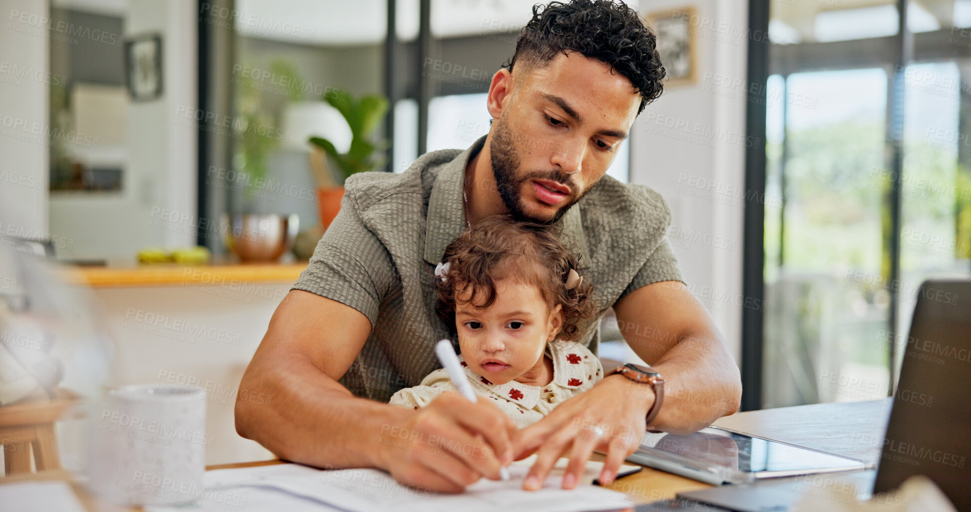Buy stock photo Writing, man or dad in home with baby or laptop for remote work, freelance research or business. Notes, single parent or father juggling parenting task for project deadline, planning or multitasking