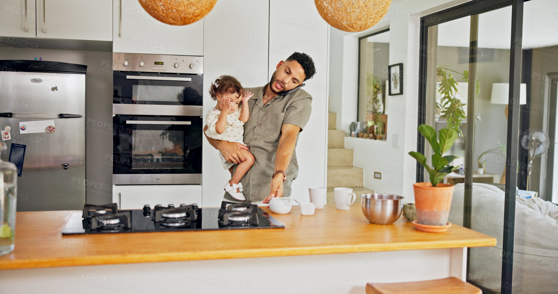 Buy stock photo Father, talk and phone call with child in kitchen for multitasking, prepare coffee and communication. Busy, man and baby with mobile for networking, productivity and chaos of time management at house