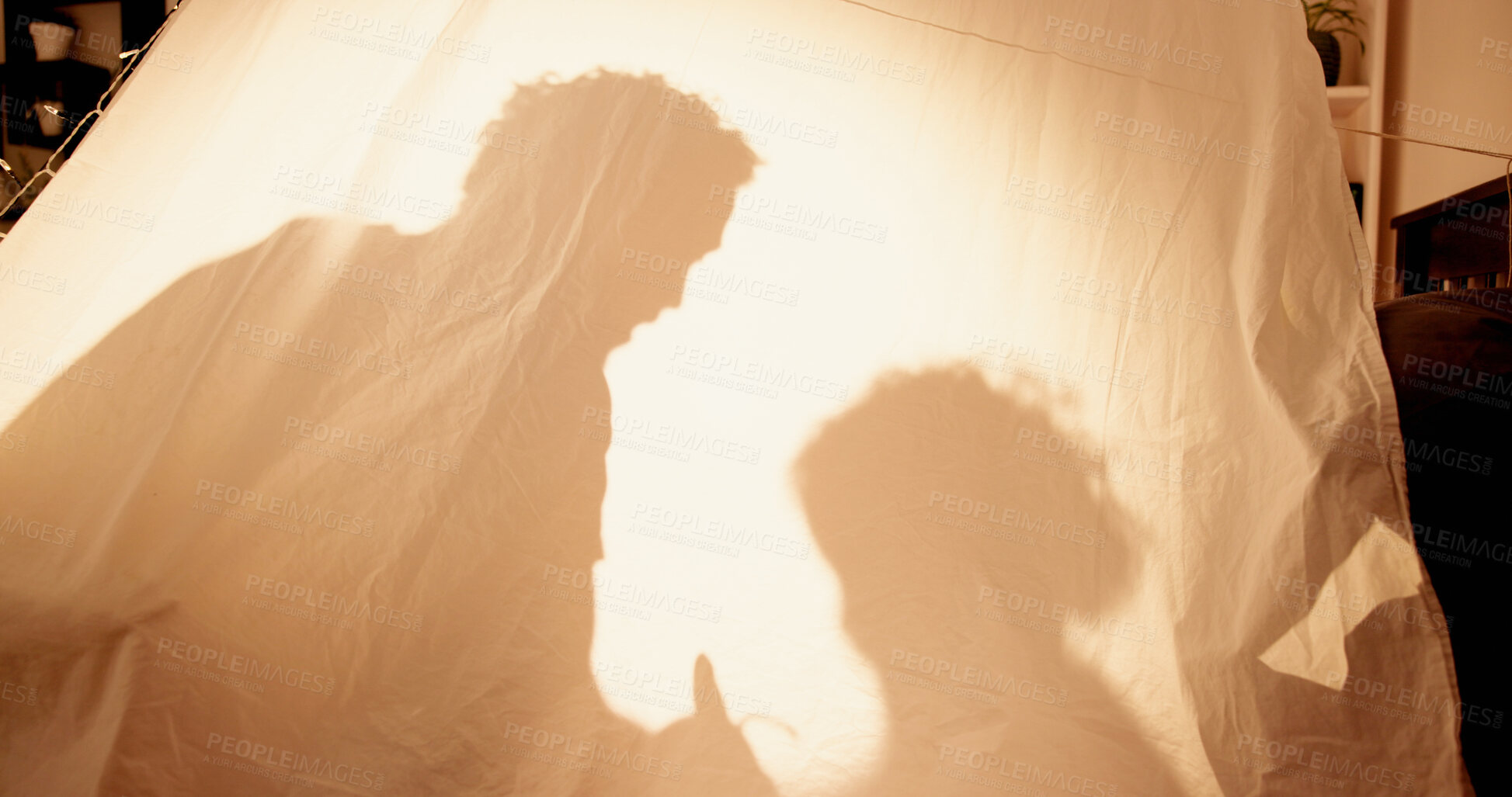 Buy stock photo Family, shadow and playing with child in tent for bonding, storytelling or childhood at night. Late, parent or kid in blanket fort with fantasy activity, imagination or relationship with love in home