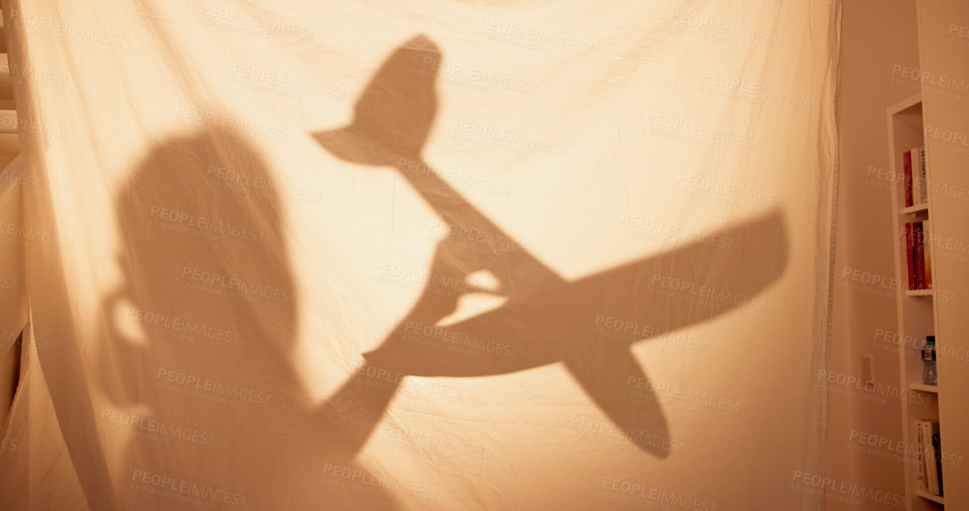 Buy stock photo Home, tent and shadow of child with toys, childhood activity and playful with imaginary play. House, kid and game with airplane for flying, curiosity and development with fantasy in apartment