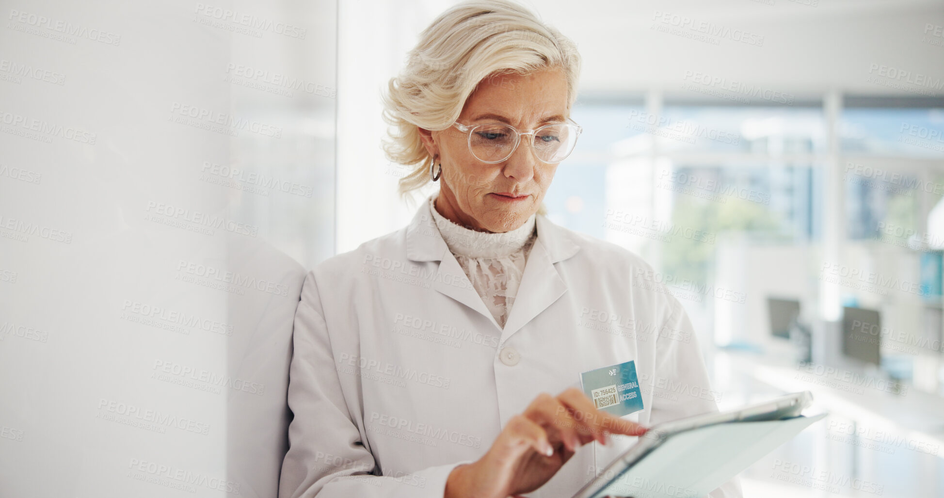 Buy stock photo Researcher, biotech and woman in lab, tablet and scroll with results for experiment. Mature person, scientist or employee in workplace, chemistry and app with internet, research or medical expert