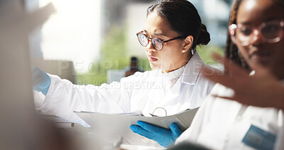 Buy stock photo Healthcare, scientists and women with document, lab and info for treatment of disease or cure. Medical research, reading and collaboration for project in clinic, pharmaceutical and people with notes