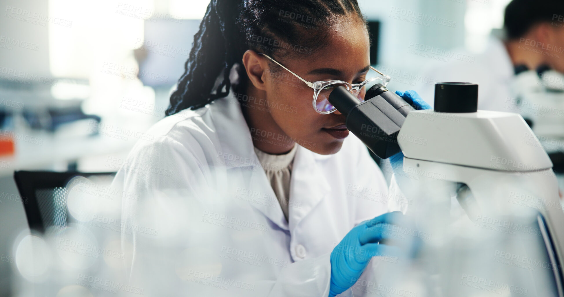 Buy stock photo Microscope, science and woman with test for medical experiment in laboratory, healthcare and innovation. Scientist, research and microbiology for cure development, pharma study and biotechnology exam