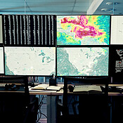Screen, weather and computer for wind forecast for news, research or ...