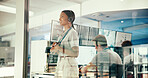 Ideas, woman and meteorologist by window in office with headset for broadcast with news. Thinking, tech and female weather reporter with climate change update with forecast on media in workplace.