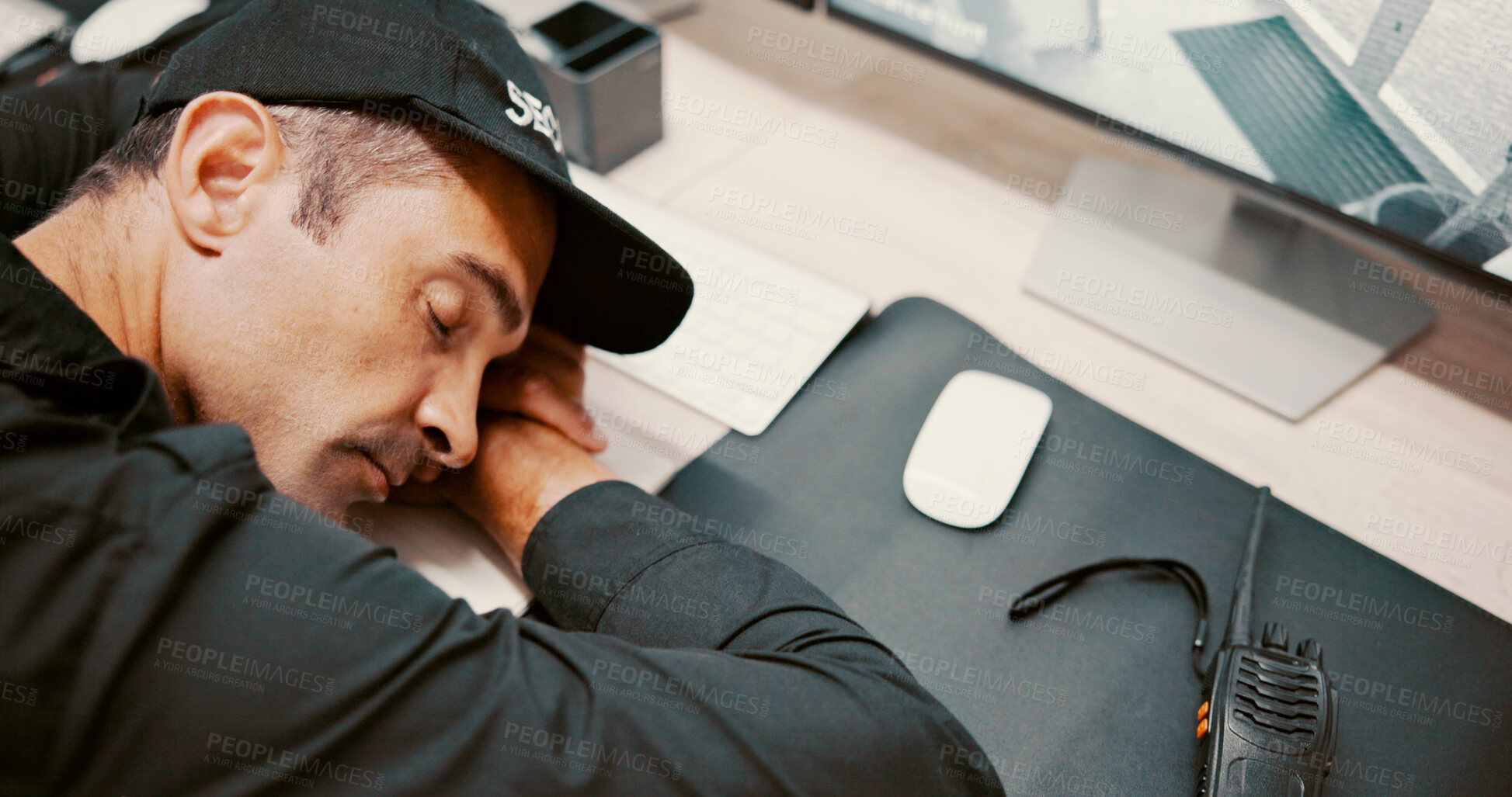 Buy stock photo Security guard, sleeping and man in control room, exhausted and resting with fatigue. Male person, burnout and employee in office, computer and tired with break, cctv for safety and surveillance