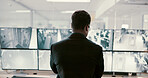 Camera, security and back of man on computer screen for surveillance, inspection and monitoring. Inspection, footage and guard on monitor for protection, info and building safety in control room