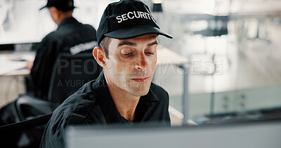 Buy stock photo Security guard, watching and man with computer, surveillance or serious for safety in control room. Digital, online and person with tech for footage, private service or review of video for protection