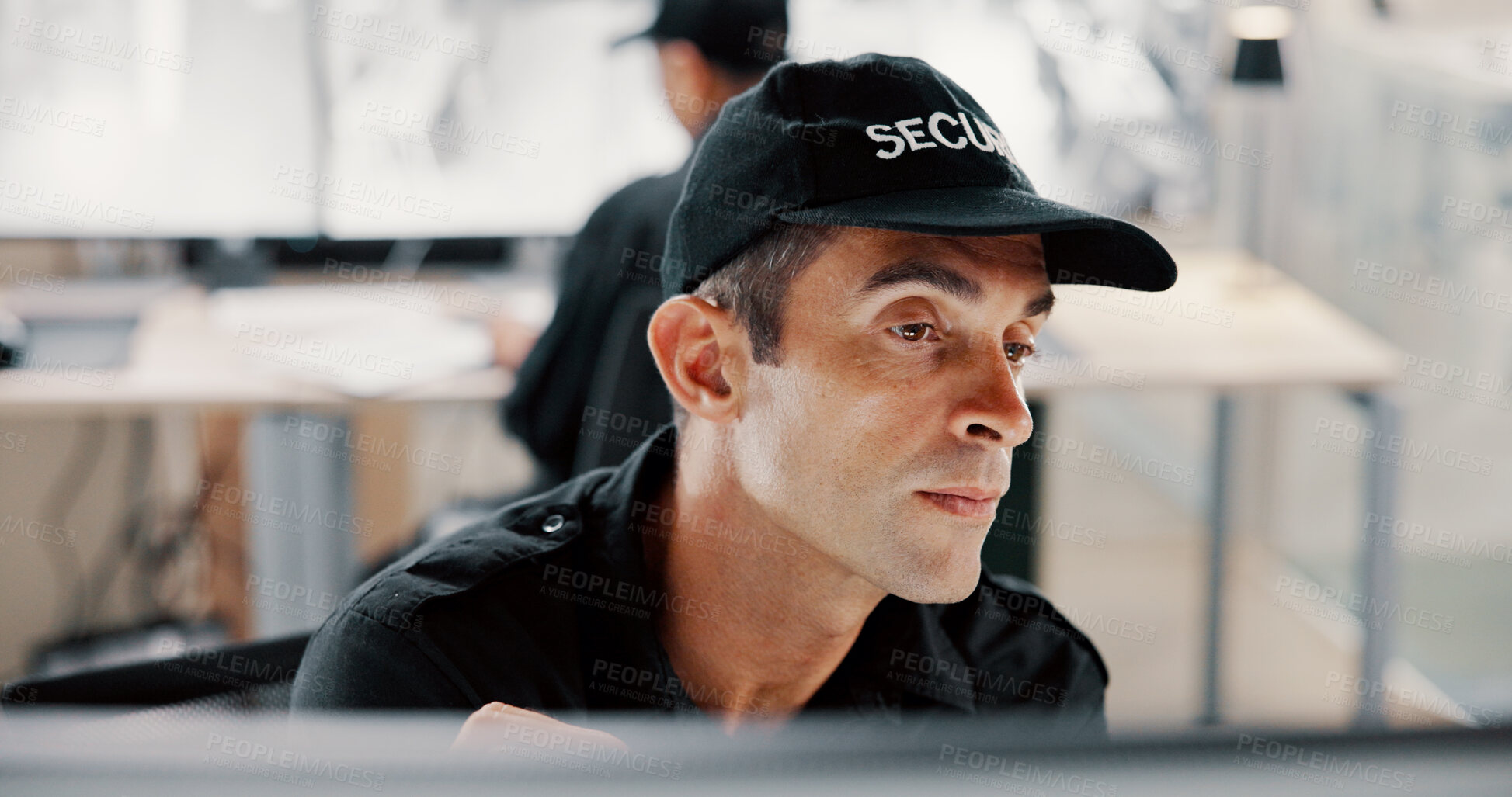 Buy stock photo Security guard, watching and man with computer, online and surveillance for safety in control room. Thinking, digital and person with tech for footage, serious and video for protection in office