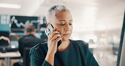 Buy stock photo Woman, phone call and stock market in office with trading, discussion or consulting for investment. Mature person, broker and financial advisor on smartphone, thinking or listen for profit results