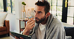 Tablet, man and sick with thermometer in home, check fever and influenza with research for symptoms. Sofa, male person and illness with temperature for flu, consultation and telehealth with digital