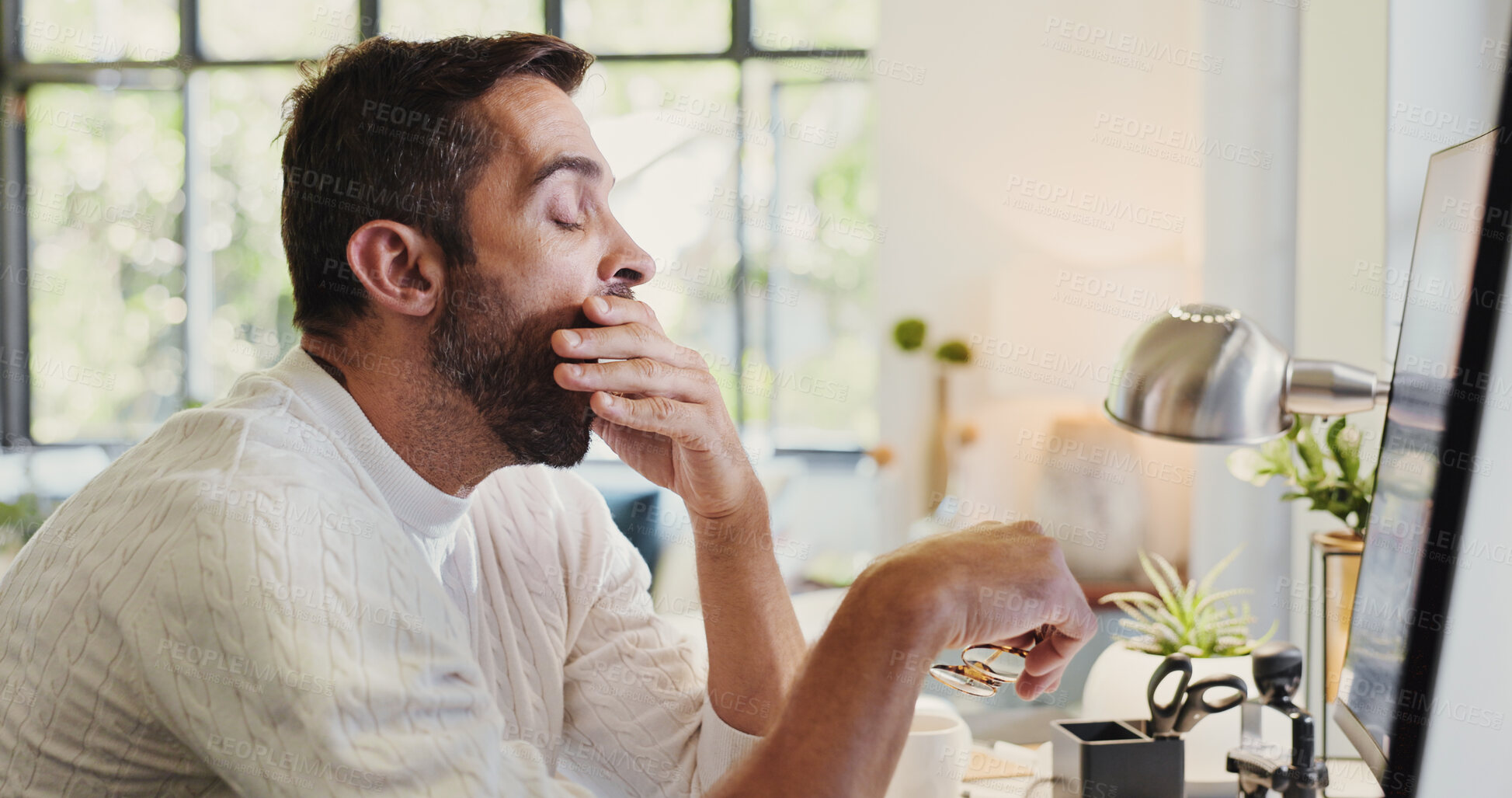 Buy stock photo Yawn, computer and man in office with tired, burnout and low energy for deadline with project. Technology, fatigue and male freelance journalist working on article with bored, overworked and lazy.