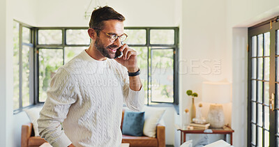 Buy stock photo Home, phone call and man in lounge, conversation and communication with connection. Apartment, person and guy with smartphone, mobile user and happiness with network, chatting or smile in living room