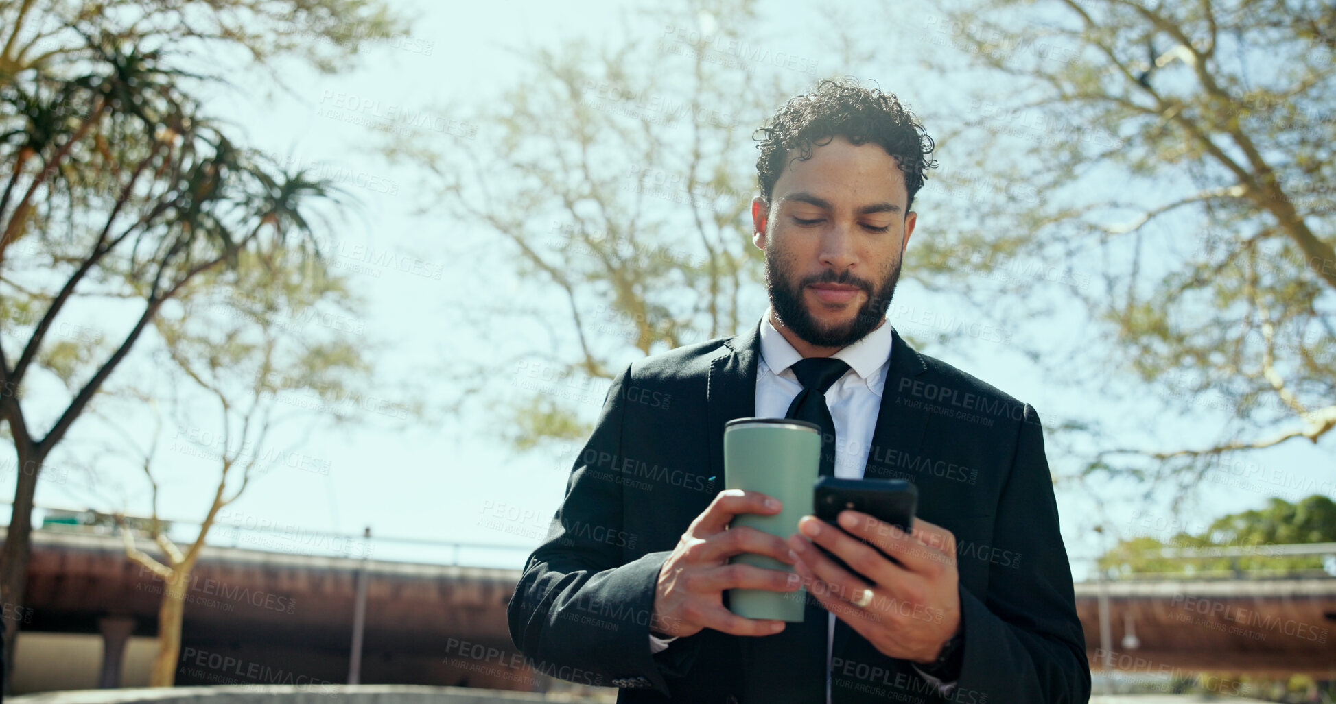 Buy stock photo Outdoor, businessman and connection with smartphone for travel map, coffee and chat on social media. Low angle, male lawyer and drink with mobile for application, navigation and message to contact