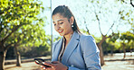 Nature, phone and businesswoman typing for networking, communication or contact for finance deal. Cellphone, outdoor and female investor with email for investment, profit or revenue report in park.
