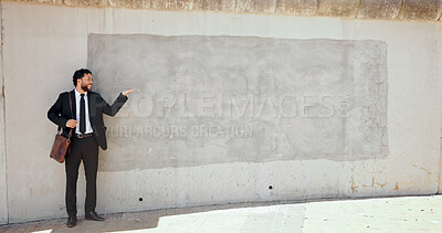 Buy stock photo Business, man and pointing to brick wall in city of advertising, announcement and interview direction. Person, mockup space and show for corporate recruitment, hiring information and onboarding offer