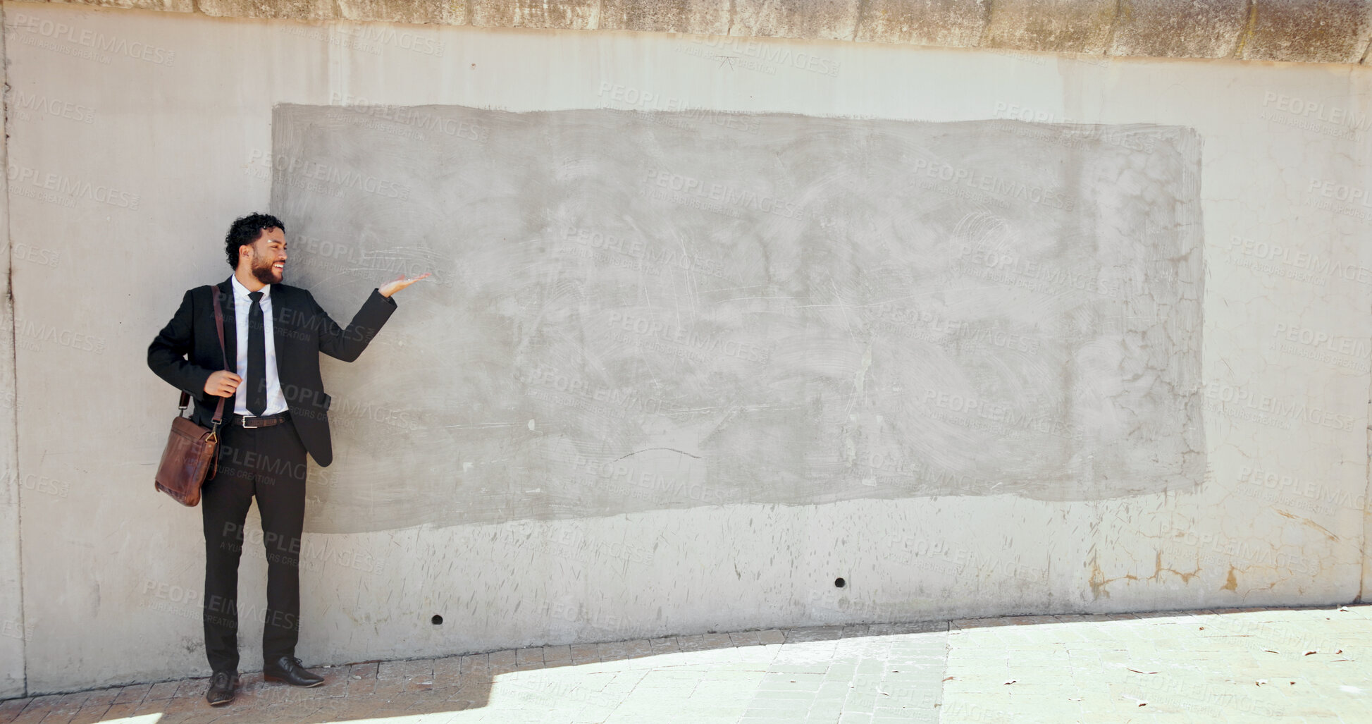 Buy stock photo Business, man and pointing to brick wall in city of advertising, announcement and interview direction. Person, mockup space and show for corporate recruitment, hiring information and onboarding offer