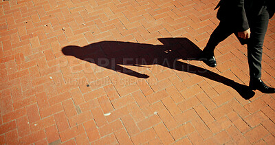 Buy stock photo Business man, shadow and walking with feet outdoor for morning commute, journey to work and corporate travel. Above, person and briefcase for career opportunity, movement and departure on pavement