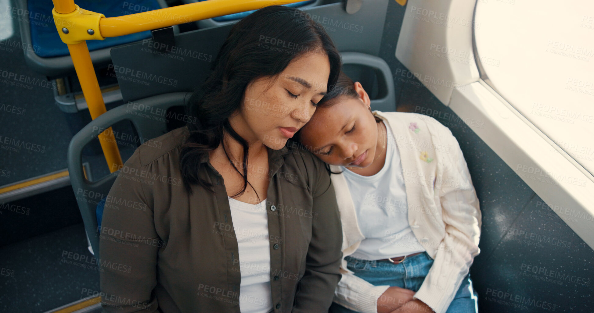 Buy stock photo Tired, mother and child with sleeping on bus for road trip, journey and fatigue on commute. Above, woman and girl kid with nap on public transport for resting, city service and exhausted with travel