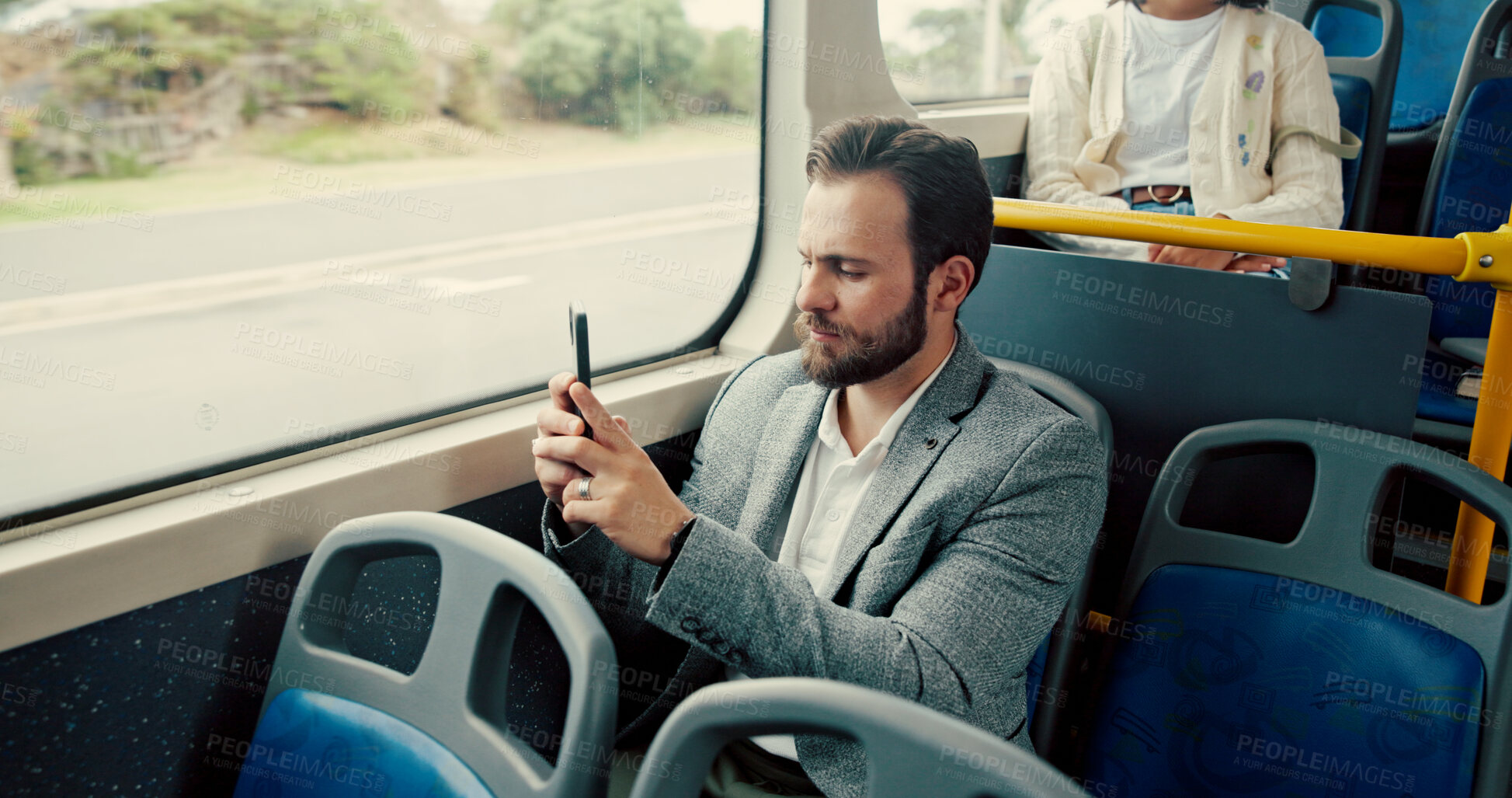 Buy stock photo Bus, photo and man with smartphone, travel and digital app for photography, commute and urban journey. Person, public transportation or guy with cellphone, capture and memory with video or internet