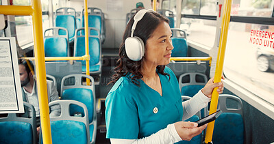 Buy stock photo Bus, travel and woman by rail with headphones for journey, morning commute and trip in city. Public transport, passenger and nurse with phone listen to music on vehicle to work, job or career in town