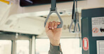 Hand, bus and safety with person, handle and travel with public transportation. Closeup, metro and passenger with routine, urban journey and morning commute with city service, trip and New York