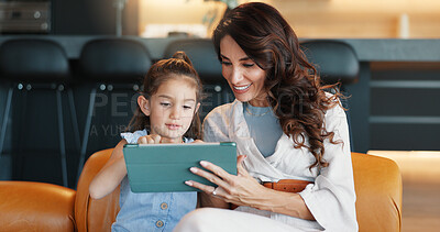 Buy stock photo Tablet, elearning and mother with kid on sofa for playing educational games with online app. Happy, connection and mom teaching girl with digital technology for bonding, development or growth in home