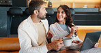 Home, conversation and couple on sofa, laptop and connection with coffee in lounge. Apartment, man and woman on couch, computer and discussion for entertainment, internet and latte with website info