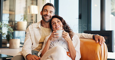 Buy stock photo Home, relax and couple with coffee, portrait and bonding together in living room. Smile, apartment and man with woman, cappuccino or relationship with care, romance and happiness with comfort or love