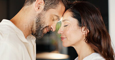Buy stock photo Connection, love and couple in home with care, bonding and forehead touch in morning for greeting. Happy, romantic and man with woman for support, safety and commitment in marriage in house together.