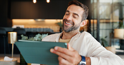 Buy stock photo Laughing, remote work and tablet with man in home for research or small business development. Funny, reading and report with freelance entrepreneur in living room of apartment for startup planning